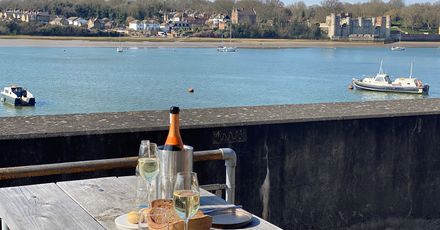 Copper Rivet table with castle in distance